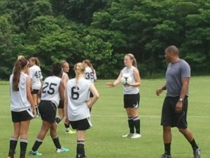 Maryland coach Jonathan Morgan works with players at the FASA Girls Collegiate Soccer Camp on June 17, 2013.
